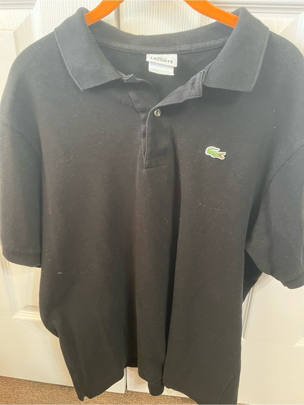 Lacoste black golf shirt size 6